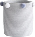 Un panier a linge associe une structure pliante a une partie textile en coton